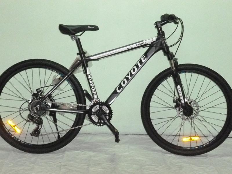 จักรยานเสือภูเขาอลูมิเนียมขนาด 26 นิ้ว ดิสเบรค 24 สปีด ของใหม่ Coyote รุ่น Ultra Mountain bike aluminum 26-inch disc brakes, 24-speed version of the new Coyote Ultra.