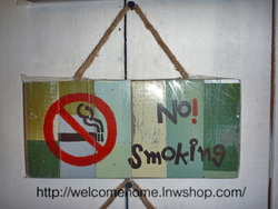    No smoking sign on for any of the small restaurants on Welcome Home.